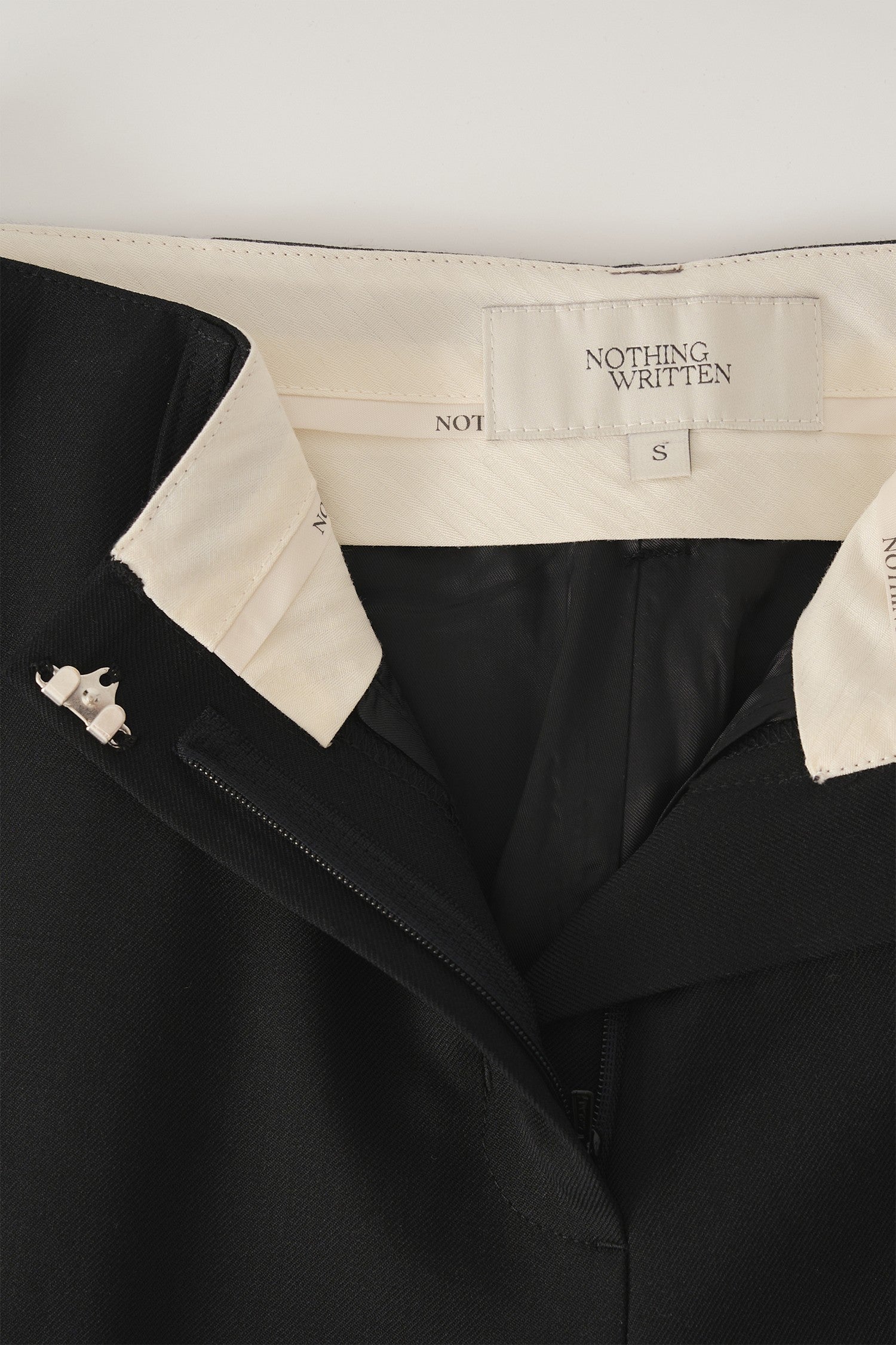 LOW-RISE TAILORED WOOL TROUSERS