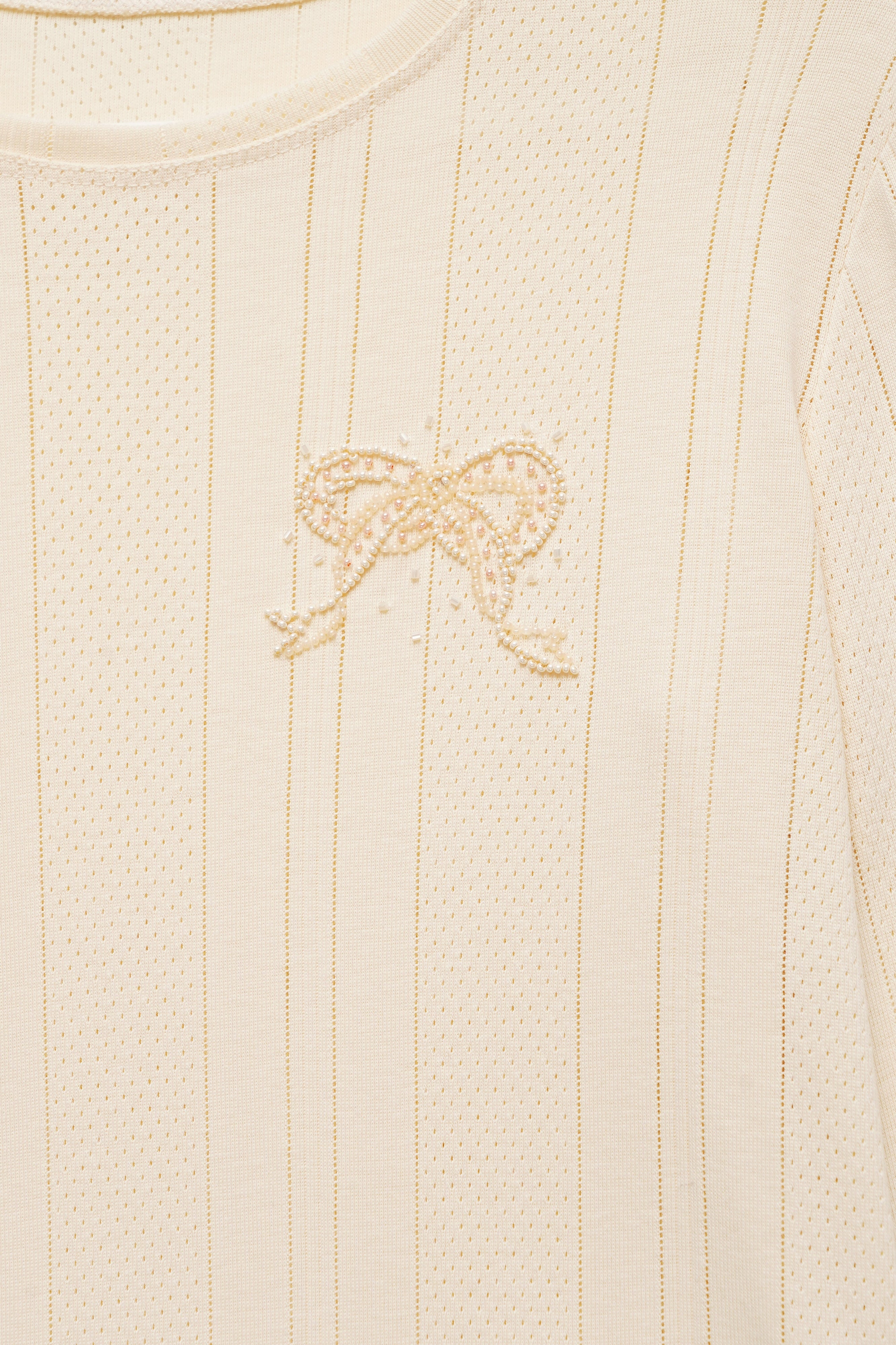 TEXTURED LONG SLEEVE TOP IN MILK