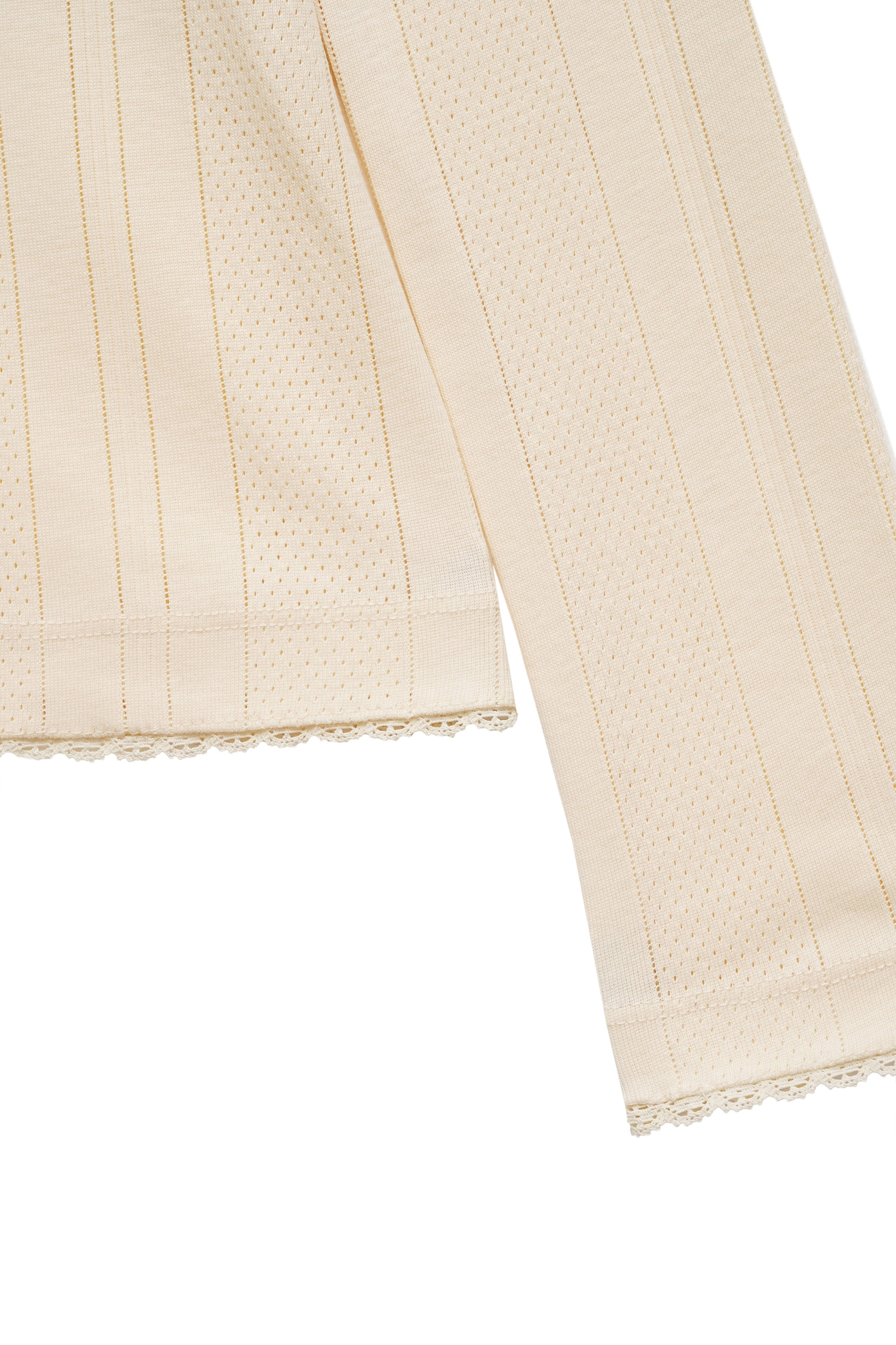 TEXTURED LONG SLEEVE TOP IN MILK