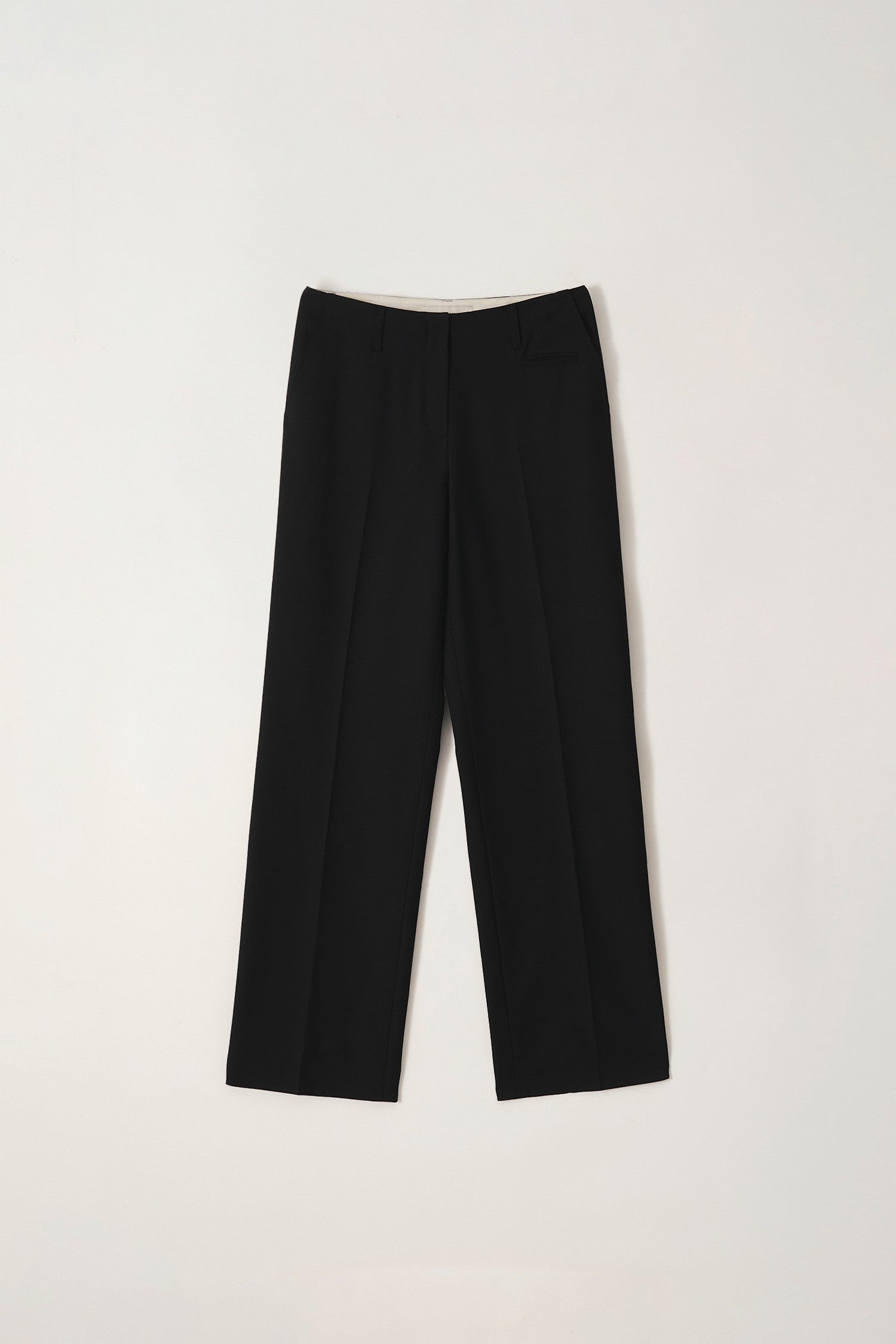 LOW-RISE TAILORED WOOL TROUSERS