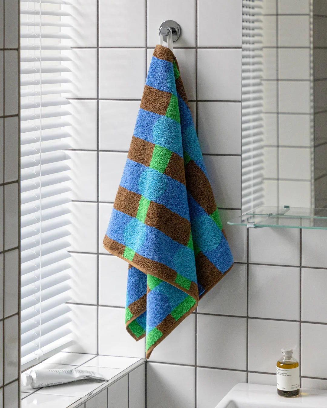 DOT CHECK FACE TOWEL - BLUE ON BRICK